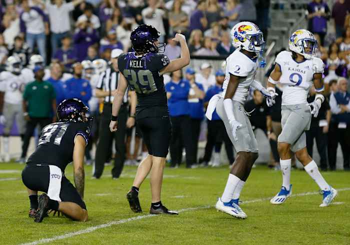 Nov 20, 2021; Fort Worth, Texas, USA; TCU Horned Frogs place kicker Griffin Kell (39) follows thru on the eventual game winning field goal against the Kansas Jayhawks during the second half at Amon G. Carter Stadium. Mandatory Credit: Raymond Carlin III-USA TODAY Sports